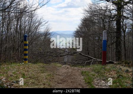 Bieszczady National Park in Southern Poland. Slovakia s and Ukrainian border posts are pictured along the touristic trail of the Krzemieniec mountain where the borders of Poland, Slovakia and Ukraine converge in the forest of the Bieszczady National Park near Ustrzyki Gorne, Poland, on April 20, 2024. Bieszczady National Park is the third-largest national park in Poland, located in Subcarpathian Voivodeship in the south-eastern corner of the country. In 2021, the national park became a UNESCO World Heritage Site as an extension to the Ancient and Primeval Beech Forests of the Carpathians and O Stock Photo