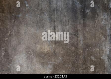 Front view of dirty and weathered wall with scratches on the surface. Abstract full frame textured grunge background with copy space. Stock Photo