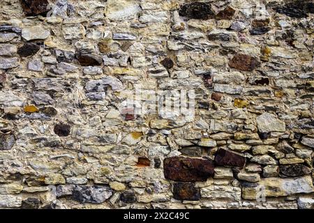 Stone cladding texture formed by old rustic stones and bricks ...