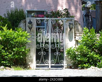 Miami, Florida, United States - April 6, 2024: Entrance to a garden of Coconut Grove. Stock Photo