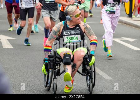 London Marathon 2024: Jani Barré on route to breaking the Guinness World record for fastest marathon in a non-racing wheelchair (female)  in a time of 04:19:21 Stock Photo