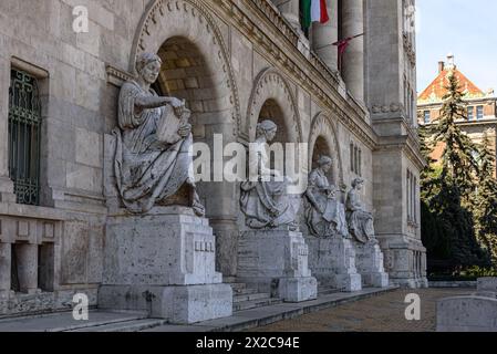 The statues of women representing the engineering sciences at the entrance to the K building of the Budapest University of Technology and Economics Stock Photo
