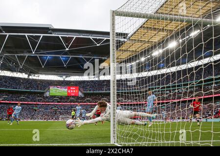 London, UK. 21st Apr, 2024. Coventry City goalkeeper Bradley Collins (40) saves remote during the Coventry City FC v Manchester United FC Emirates FA Cup Semi-Final match at Wembley Stadium, London, England, United Kingdom on 21 April 2024 Credit: Every Second Media/Alamy Live News Stock Photo