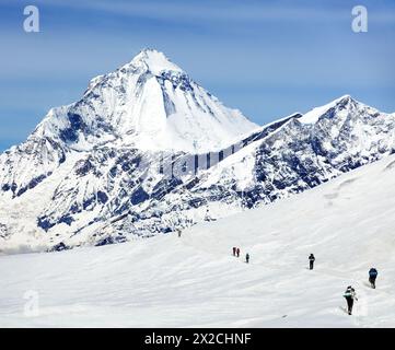 Mount Dhaulagiri and hikers on glacier, Himalayas mountains, Dhaulagiri himal, Nepal Stock Photo