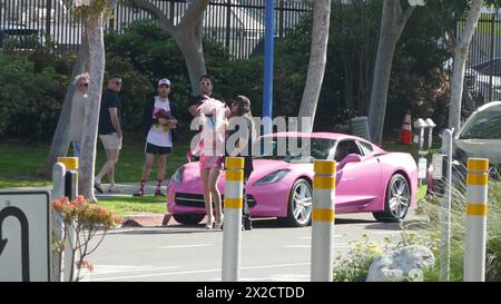 West Hollywood, California, USA 21st April 2024 Angelyne with her Pink Corvette at her Billboard on Santa Monica Blvd on April 21, 2024 in West Hollywood, California, USA. Photo by Barry King/Alamy Stock Photo Stock Photo