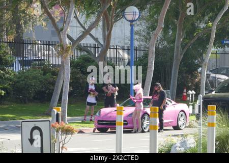 West Hollywood, California, USA 21st April 2024 Angelyne with her Pink Corvette at her Billboard on Santa Monica Blvd on April 21, 2024 in West Hollywood, California, USA. Photo by Barry King/Alamy Stock Photo Stock Photo