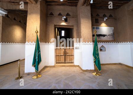 Riyadh, Saudi Arabia - February 10 2023: National flags displayed in the Interior of the Masmak fort in Riyadh old town in Saudi Arabia capital city. Stock Photo