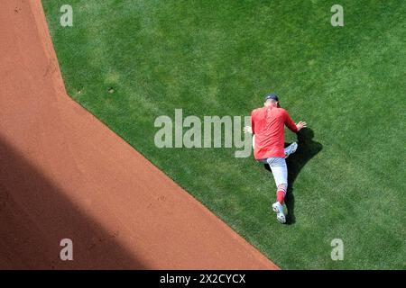 Professional baseball player stretches and warms up; St. Louis ...