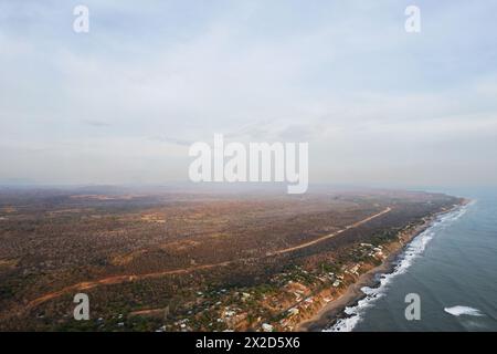 Building new road next to beach in Nicaragua aerial drone view Stock Photo