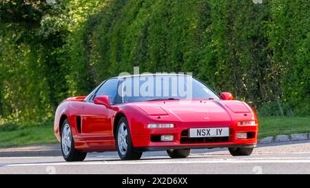 Bicester,UK- Apr 21st2024: 1991 red Honda NSX classic car driving on a British road Stock Photo