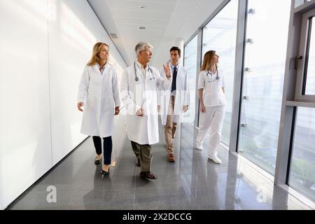 Doctors and nurses walking in corridor, Onkologikoa Hospital, Oncology Institute, Case Center for prevention, diagnosis and treatment of cancer, Donos Stock Photo