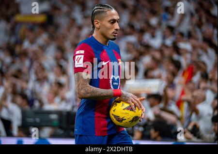 Madrid, Spain. 21st Apr, 2024. Raphael Dias Belloli (Raphinha) of FC Barcelona seen during the La Liga EA Sports 2023/24 football match between Real Madrid vs FC Barcelona at Estadio Santiago Bernabeu. Real Madrid 3 : 2 FC Barcelona (Photo by Alberto Gardin/SOPA Images/Sipa USA) Credit: Sipa USA/Alamy Live News Stock Photo