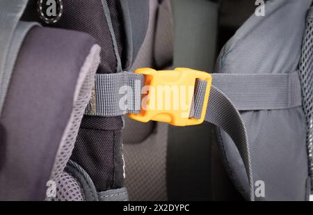 Yellow plastic clasp of backpack, full frame image Stock Photo