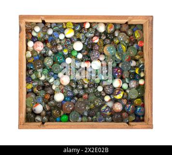 Collection of old glass marbles, isolated on white Stock Photo