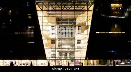 Night detail of contemporary facade shows an example of Scandinavian architecture in Copenhagen. Black diamond shaped modern library exterior Stock Photo