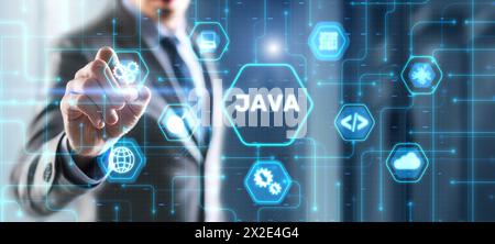 Businessman clicks Java programming language application concept on virtual screen Stock Photo