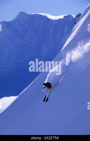 Woman big mountain skiing in Haines, Alaska Stock Photo