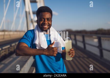 Portrait of young african-american man who is ready for sports training. Stock Photo