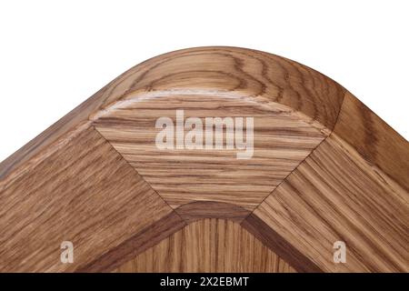 Close-up of wooden tabletop made from solid oak and oak veneer of marquetry technique with clear varnish finish isolated on white background Stock Photo