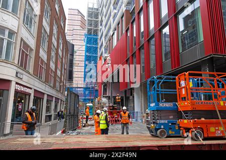 View of 1 Broadgate new building site under construction from Eldon St cranes scaffolding workers working City of London EC2  England UK KATHY DEWITT Stock Photo