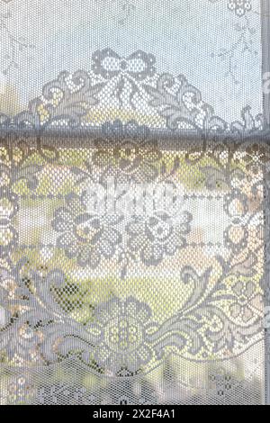 Old fashioned lace. Net curtains in Georgian townhouse, Paultons Square, Chelsea, London, UK. Stock Photo