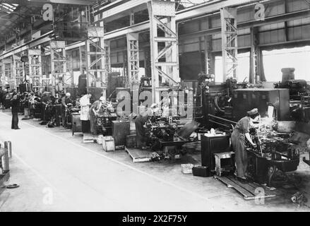 At the Royal Ordnance Factory in Leeds, workers machined small mechanical components as part of Britain��s war production during the Second World War, supporting military supply and armaments. Stock Photo