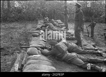 BELGIAN COMMANDOS IN TRAINING, UK, 1945 - Men of the 2nd Battalion, 2nd Belgian Brigade at shooting practice as part of their Commando training. The original caption states that they are using live ammunition at twenty yards Stock Photo