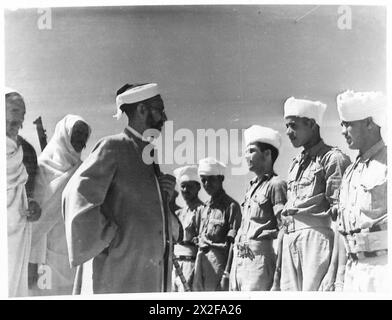 VISIT TO ITALIAN PRISONER OF WAR CAMP - Sayed Idris chatting to some of the prisoners during his inspection British Army Stock Photo