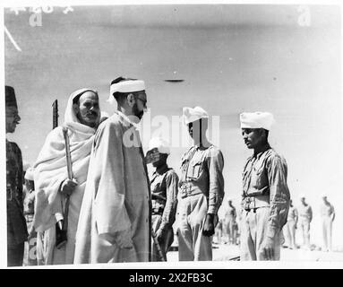 VISIT TO ITALIAN PRISONER OF WAR CAMP - Sayed Idris chatting to some of the prisoners during his inspection British Army Stock Photo