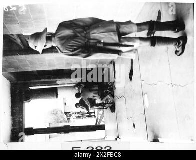 Italian prisoners of war are shown in camp life, illustrating daily ...