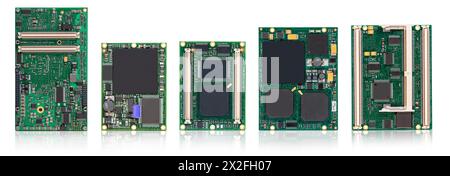 Collection of different types of embedded CPU modules with integrated chips and connectors, isolated on a white reflective background. Stock Photo