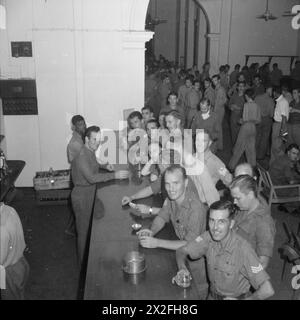 Recently released British prisoners of war march toward an airfield in ...
