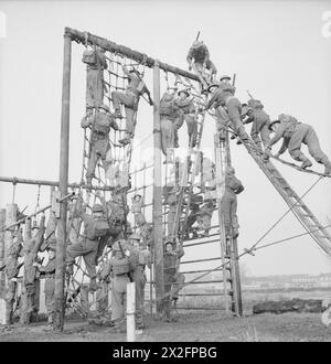 Soldiers perform physical training exercises to improve readiness and ...