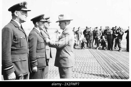 AWARD OF U.S.A. DISTINGUISHED SERVICE MEDAL TO BRITISH AND CANADIAN OFFICERS : FRANKFURT - Air Marshal Sir James Robb, Royal Air Force, being decorated by President Truman British Army, 21st Army Group Stock Photo