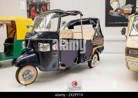 An old presidential Ape on display at the Piaggio museum in Pontedera, Pisa, Italy Stock Photo