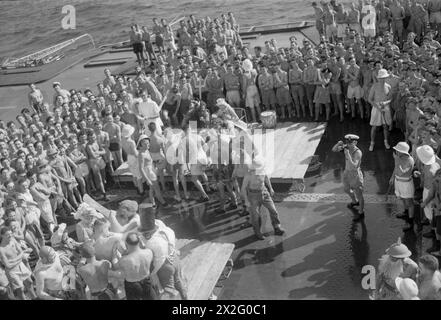 WITH HMS INDOMITABLE. AUGUST 1944, ON BOARD THE AIRCRAFT CARRIER AS SHE ...