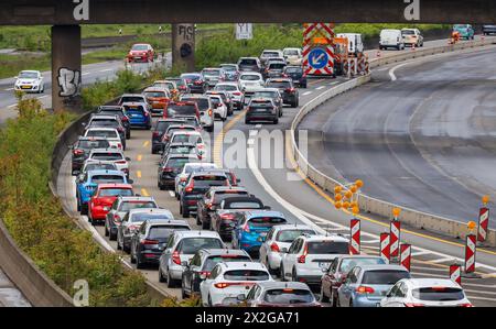 Duisburg, North Rhine-Westphalia, Germany - Traffic jam on the A40 motorway at the Kaiserberg junction. The busy area with the A40 and A3 motorways ha Stock Photo