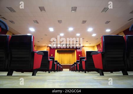 back view of empty red velvet seats in movie theater Stock Photo - Alamy