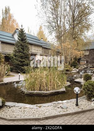 The tranquil courtyard offers a serene atmosphere for relaxation and contemplation amidst beautiful natural surroundings. Stock Photo