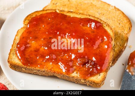 Healthy Strawberry Jam on Toast for Breakfast Stock Photo