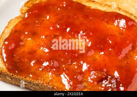 Healthy Strawberry Jam on Toast for Breakfast Stock Photo