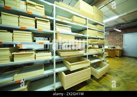 on shelves many picture frames of different sizes in large store Stock Photo
