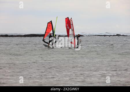 Group of wind surfers at El Cotillo, Fuerteventura. Taken February 2024 Stock Photo