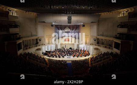 MOSCOW - FEBRUARY 26: Audience listens to concert of Symphony Orchestra of Moscow State Conservatory named after P. Tchaikovsky in Tchaikovsky Concert Stock Photo