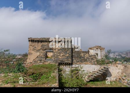 An ancient historical castle constructed using stones in ancient Arabian architecture in the Al Baha region of Saudi Arabia. Stock Photo