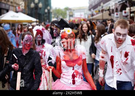 MOSCOW - MAY 14: Unidentified lauhging participants of Zombie Walk on Old Arbat, May 14, 2011, Moscow, Russia. Stock Photo