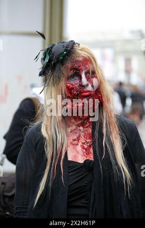 MOSCOW - MAY 14: Unidentified made-up female participant with mutilated face in mourning dress at Zombie Parade on Old Arbat, May 14, 2011, Moscow, Ru Stock Photo