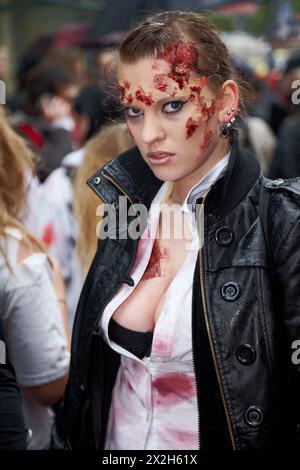 MOSCOW - MAY 14: Unidentified made-up female participant with fragments of broken glass on her face at Zombie Walk on Old Arbat, May 14, 2011, Moscow, Stock Photo