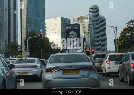 Tel Aviv, Israel. 22nd Apr, 2024. A huge banner bearing a portrait of Hamas leader YAHYA SINWAR welcomes drivers into Tel Aviv calling for national solidarity within. Credit: Nir Alon/Alamy Live News Stock Photo