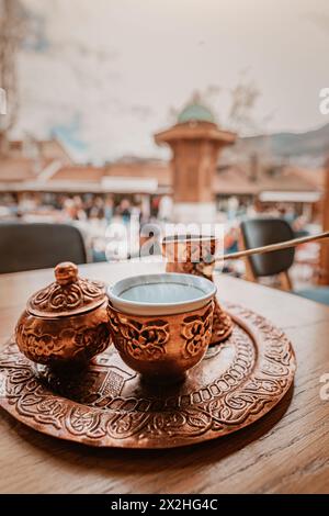 In Sarajevo's historic cafes, vintage copper coffee pots evoke the aroma of tradition and the warmth of East. Stock Photo